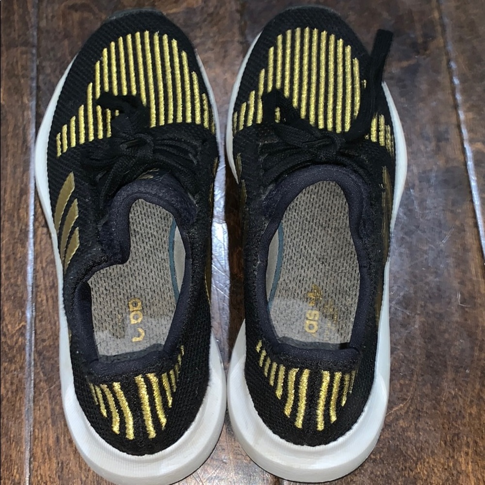 Adidas black and gold